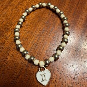Silver and Cream Beaded Bracelet with Gemini Zodiac Charm